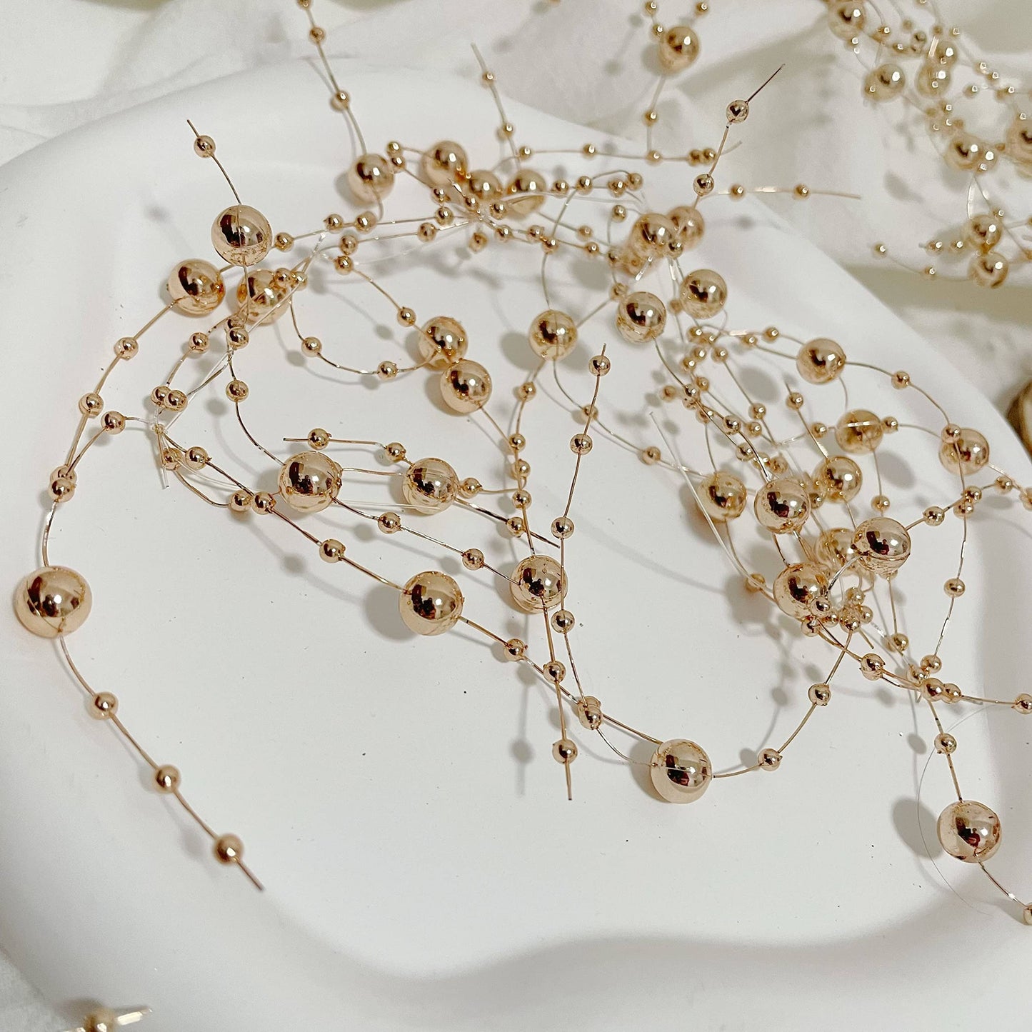 TeaSu 24Pcs Pearl String for Floating Candle Centerpieces. Floating Pearls for Wedding Centerpieces and Home Decorations - Champagne Gold